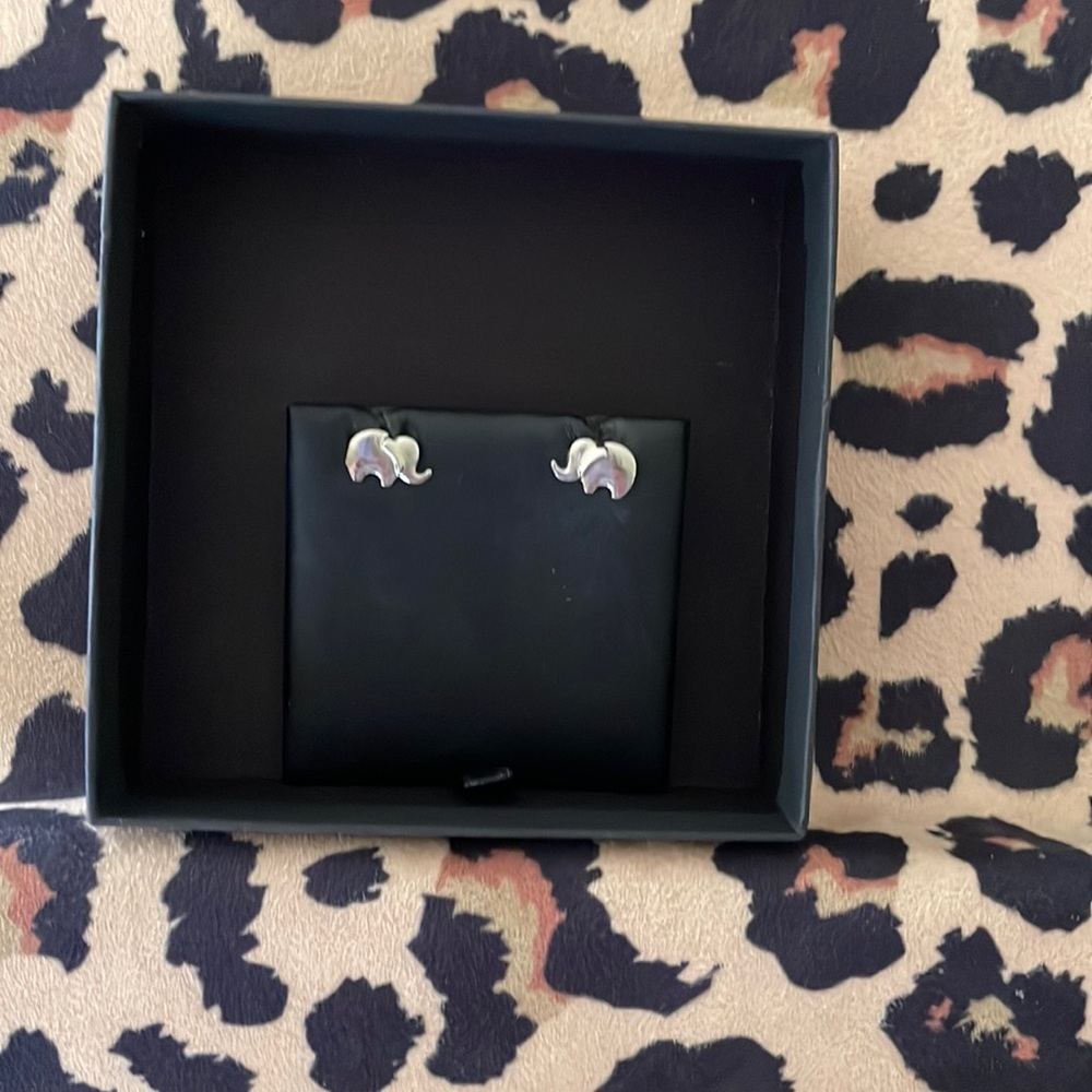 Silver elephant post earrings.